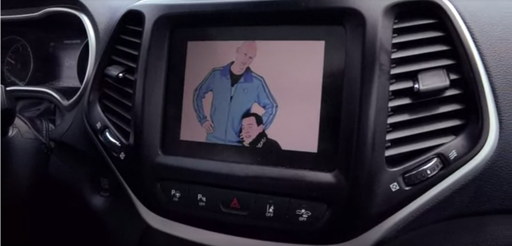 A picture of Miller and Valasek appear on the Jeep dashboard that Greenberg is driving while they were hacking the SUV. Source: http://www.wired.com/2015/07/hackers-remotely-kill-jeep-highway/